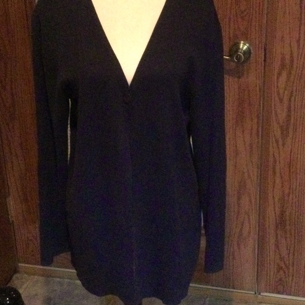 Women’s navy long sleeved sweater size M.